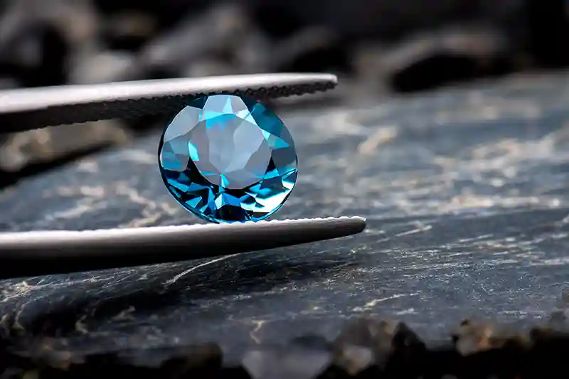 melynasis topazas blue topaz